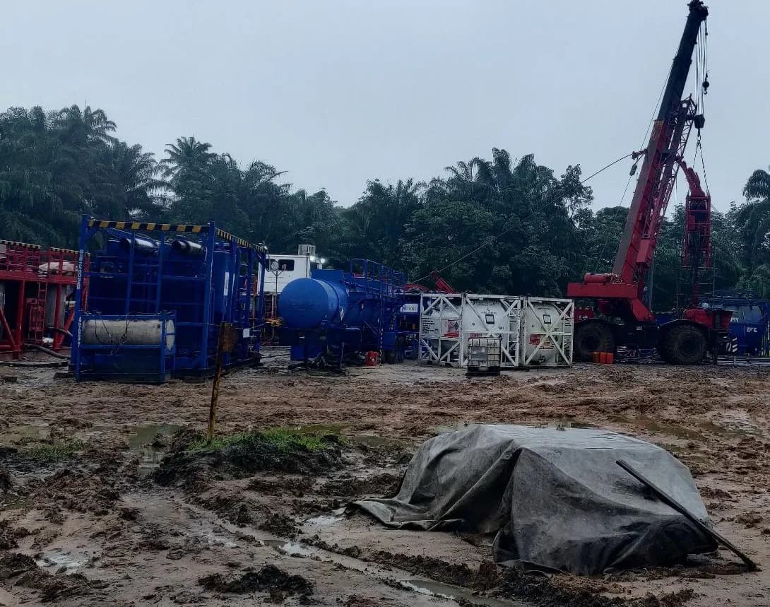 Coil tubing equipment on location during the wet season
